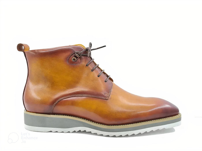 Tan leather boots with sleek finish