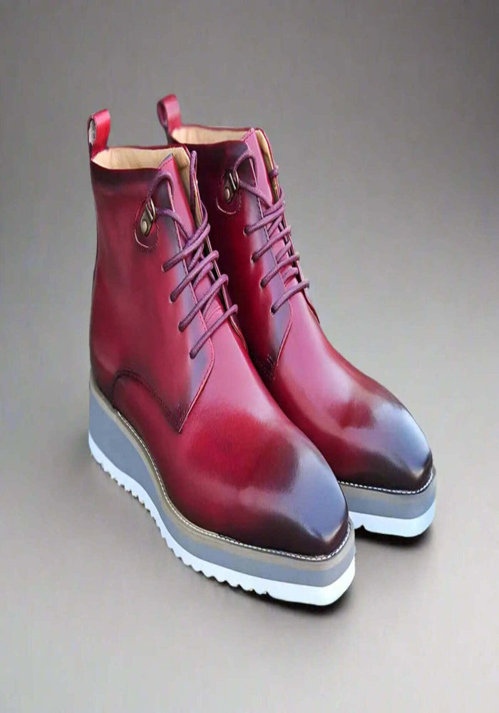 Cherry red boots with white sole