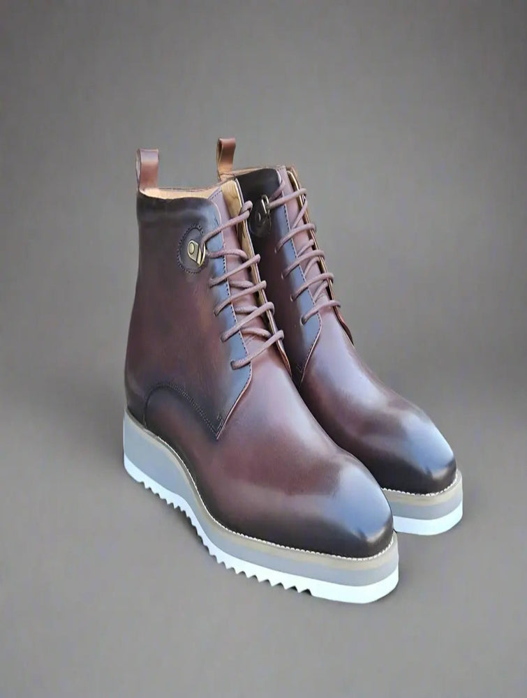 Grey-brown boots with white sole