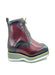 Red leather boots with black sole