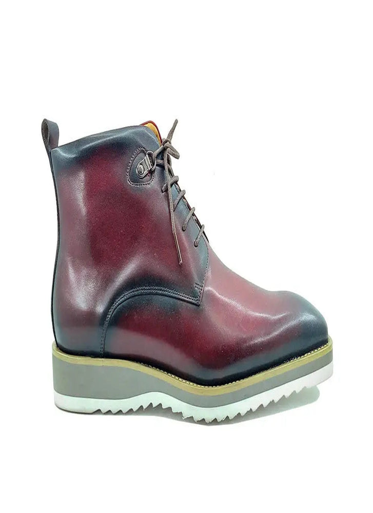 Red leather boots with black sole