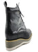 Shiny black leather boots