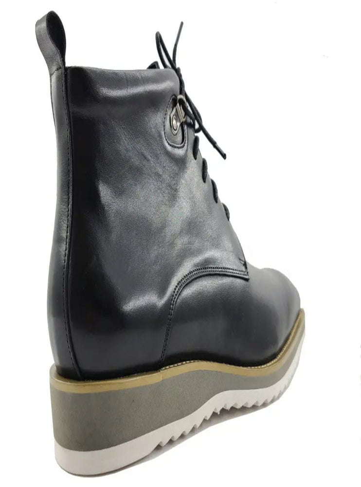 Shiny black leather boots