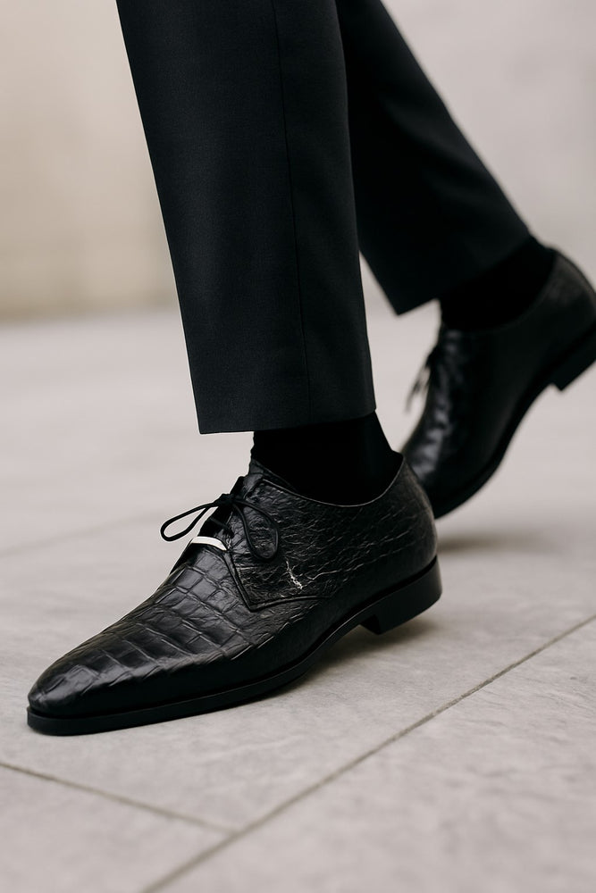 black-crocodile-dress-shoe-walking-on-marble